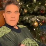 Robbie Williams Instagram - So ‘Crap’ won yesterday and is through to the next round. There was a late surge on Dick but Crap took it. How many pillows do you need to sleep with? I need 3. A small one for my head a large one to cuddle and a large one between my legs. That wasn’t meant to be a joke but here we are. Today’s swear words are Pillock V Bell End. Which one would you keep? I know those two words are very English centric so if you have no clue about either of them which one do you like the sound of? T.C.S.S.W.C S.Blatter. Namaste 🙏❤️