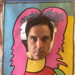 Robbie Williams Instagram - Integritas Et Cacas. Pleasantries and Hail Keanu The Comment Section Cup - Alien edition. Todays inkling ….I painted Jesus, then I didn’t like the face I drew so I cut out the face hoping to come up with some inspiration. It didn’t work out. All that’s left of it is this photograph that I took before I cut the face up. I wish I hadn’t, it’s not as bad as I thought. In other news. My mind won’t won’t have certain things go in it. The reason I say this is it struck me today when a lady I was passing said ‘’Oh your kids and my kids go to -such and such- school together’’ And I realised I didn’t know what the school was called, it just won’t go in. The name seemed foreign to me. I was watching Adventures in Babysitting the other night and BB King was in one scene. I couldn’t remember his name but I could remember his guitars name *Lucille. So I googled Lucille guitar and up came BB king.I know who BB King is of course. Always have done. But his name just fell out of my head. It just wasn’t there. And without Google, I don’t think it would have returned. Anyway, early dementia? Or is my Memory bank full? or just some normal shit? Believe - Cher V You get what you give - New Radicals Another effing cracker. which song represents the 90s the best? Write your answer in the comment section below. Peace be with you Get Sectioned cos. We taKE SILLY very SERIOUSLY R.P. Williams President/Chairman/Benevolent Dictator, Delusional Manifesting Champ. Namaste 🙏❤️