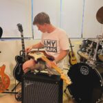 Robert Clarence Irwin Instagram - The shirt just automatically makes you good at guitar right? 😎 @amyshark