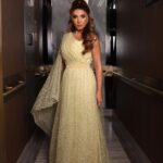 Rogena Instagram - حفل توقيع اعمال #شهر_رمضان🌙 #قناة_أبوظبي 🙏 Stylist by @osama.eldeebstyle Dress by @VELVETY_COUTURE Hair by @GUZELSALONDUBAI @RASSEN_HAIRDRESSER makeup by @ALAA.GHANDOURAH Jewelry by @bijouqofficial Photography @ADSSHOT Abudhabi