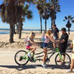 Ruby Rose Turner Instagram - tandem bikes with @nadiaturner for @clairesstores 💖🌊🌴 #projectbff #xoxoclaires Venice Beach, California