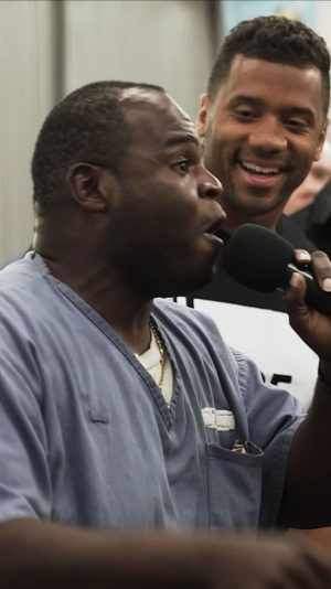 Russell Wilson Instagram - During worship inside of a maximum security prison, @dangerusswilson brought this incarcerated brother up to sing…As the band began to sing Jireh, he began to sing…The whole room of 300 inmates were in shock when they heard his voice. You could feel the environment of the room change. The presence of God filled this prison chapel as these incarcerated men Praised, Worshipped, and cheered. We will never be the same after this moment. God is working behind prison walls. Jesus still has a purpose and plan for each and every man in that room!

#christianity #jesus #love #bible #god #faith #christ #pray #gospel #jesuschrist #hope #blessed #religion #worship #scripture #prayer #godisgood #community #dailydevotional #wordofgod #salvation #preach #healing #churchlife #christianmemes