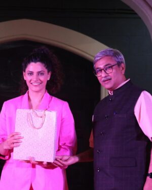 Saiyami Kher Instagram - For every little girl her first hero is always her father. I was no different. He loved his college. Xaviers not only looked like Hogwarts but it felt magically listening to my father describe it. So studying at Xaviers was always a dream. 82% was never going to be enough to get me admission there. But sport & my sister came to my rescue. My state level badminton certificates attested, my sister stood in queue & lo behold my name was on the sports quota list at St. Xaviers college. My proud father drove me from Nasik for my investiture ceremony. He couldn’t contain his excitement. The moment I stepped into Xaviers I realised why. My father took me along showing me his class & the terrace, like he was showing me his childhood house. I immediately felt at home. 
I didn’t realise how much this college was moulding me into what I am. I spent the 5 best years of my life having fun. Malhar security,playing 9 sports, soaking in the music theatre & in between this studying. I learnt how to dream, to live, to love to fight for what is right, to become a better person. Xavier’s was not a college it was a way of life. 
When I passed out,I immediately started modelling & auditioning for films. I realised how the world outside is not Xaviers, its not such a happy place. People are not kind, life is not fair & the struggle is real. But my professors had prepared me well. My friends have been my support system everytime I have been down. So for me making my family,friends & teachers proud always remains my first goal. 
A few days ago I was called to college where they felicitated me for Ghoomer. This time around I drove my father from Nasik. My professors met me with their eyes filled with pride. My father took me around again showing me same the class & the same terrace, this time it took longer, I had to share my memories as well. He watched me go up on stage, heard all the kind words of praise & couldn’t contain his excitement, with tears flowing down his cheeks. My first hero was very proud of me. I hope I can continue to make him, my family, friends & teachers feel proud. I have a long long way to go, but this part of my life, this little part, is called HAPPINESS ❤️