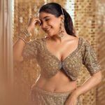 Sakshi Agarwal Instagram - Crowned in couture, feeling like a modern maharani. 👸🌟 #lehengaroyalty . Jewellery : @challani_jewellery Hmua: @murugeshmakeup_hair @shalini_hairartist Location: @crowneplazachn Designer: @dvasabyabhi Chennai, India