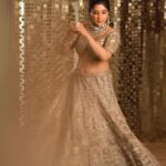Sakshi Agarwal Instagram - Feeling elegant in golden abundance✨✨ . Jewellery : @challani_jewellery Hmua: @murugeshmakeup_hair @shalini_hairartist Location: @crowneplazachn Designer: @dvasabyabhi . #instagramreels #reelsinstagram #goldenlehenga #feelingbeautiful #goldengirl #sakshiagarwal #kollywood #beautymakeup #trendingreels #trendingnow Chennai, India