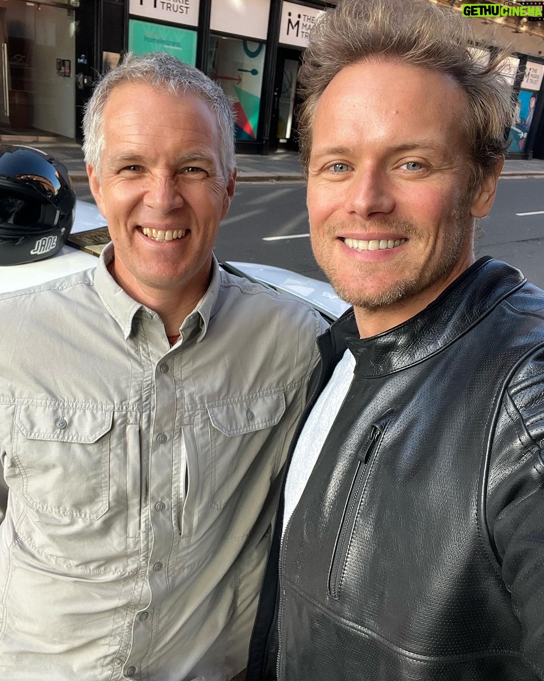 Sam Heughan Instagram - So good to finally meet Jake Norton in person @mountainworld ! Not content to climb the peaks of Nepal (Everest several times!) but now is conquering the windy Munros in Scotland. Good to see you buddy, look forward to hiking with you soon!🏔️