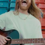 Sam Ryder Instagram - I was allowed to do 1 take in the stands before practice started so I was desperate not to mess this up haha! ⚽️🤞 THAT REVERB! ⚡️(wait for the moment i let the stadium sing back & i’m in heaven) 👼 Full vid on my YT nowww 👀