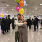 Sam Thompson Instagram - She brought balloons 😂🥹 Reunited with the love of my life. What a trip, what a lucky guy I am 🥹❤️❤️❤️ spot an awkward Pete 😂