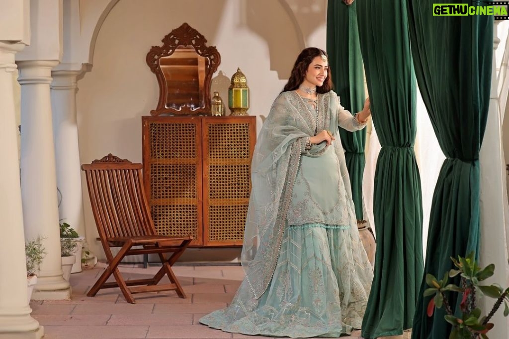 Sana Javed Instagram - Explore Naqshi's collection—a perfect blend of tradition and modern allure. Crafted with care on raw silk and organza, these outfits redefine luxury, celebrating each moment with timeless elegance and a touch of contemporary style. Brand: @naqshiclothingstore Photography: @yasser.sadiq_ Videography: @filmsbybilal Stylist: @shaamlatiph Mua: @sunil_mua Art Direction: @afshan.khalid01