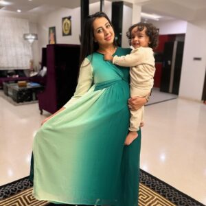 Sanjjanaa Instagram - Parenthood is indeed a journey filled with challenges and sacrifices, but it also brings countless joys and beautiful moments. It’s wonderful to see how effortlessly comfortable my outfit from @momzjoy looks while i am holding my baby in my arms. This showcases the versatility and practicality of clothing designed for @momzjoy , allowing me to attend various events while still being able to care for your little one with ease. Parenthood teaches us to embrace every moment and find beauty in the chaos. Enjoying these precious times with my baby and yet look super stylish like a Mom #diva wearing stylish attires from  @momzjoy ! 

As an actress, my life has been consumed by self-centeredness, solely dedicated to my career, personal aspirations, and ambitions in the past. But, oh, how everything shifted when my beloved son, @PrinceAlarik, graced my existence with his presence.

As I stepped into the realm of motherhood, a beautiful transformation occurred within me. It was as if a veil had been lifted, revealing a profound shift in my perspective. Suddenly, the needs and happiness of my precious child became the centerpiece of my world, eclipsing my own dreams and aspirations. This profound metamorphosis had far-reaching effects, intertwining with every facet of my existence. From the choices I made in my professional journey to the way I managed my time, everything now revolved around nurturing and cherishing my little one. With tender devotion, I embraced the path of motherhood, prioritizing the bonds of my cherished family above all else.

The overwhelming bliss and deep affection that fills my heart for my beloved son are beyond measure. Every single moment spent with him holds profound significance, as I treasure the precious milestones and witness his remarkable growth and development ...