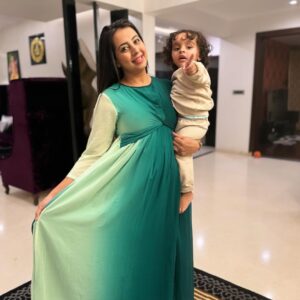 Sanjjanaa Instagram - Parenthood is indeed a journey filled with challenges and sacrifices, but it also brings countless joys and beautiful moments. It’s wonderful to see how effortlessly comfortable my outfit from @momzjoy looks while i am holding my baby in my arms. This showcases the versatility and practicality of clothing designed for @momzjoy , allowing me to attend various events while still being able to care for your little one with ease. Parenthood teaches us to embrace every moment and find beauty in the chaos. Enjoying these precious times with my baby and yet look super stylish like a Mom #diva wearing stylish attires from  @momzjoy ! 

As an actress, my life has been consumed by self-centeredness, solely dedicated to my career, personal aspirations, and ambitions in the past. But, oh, how everything shifted when my beloved son, @PrinceAlarik, graced my existence with his presence.

As I stepped into the realm of motherhood, a beautiful transformation occurred within me. It was as if a veil had been lifted, revealing a profound shift in my perspective. Suddenly, the needs and happiness of my precious child became the centerpiece of my world, eclipsing my own dreams and aspirations. This profound metamorphosis had far-reaching effects, intertwining with every facet of my existence. From the choices I made in my professional journey to the way I managed my time, everything now revolved around nurturing and cherishing my little one. With tender devotion, I embraced the path of motherhood, prioritizing the bonds of my cherished family above all else.

The overwhelming bliss and deep affection that fills my heart for my beloved son are beyond measure. Every single moment spent with him holds profound significance, as I treasure the precious milestones and witness his remarkable growth and development ...