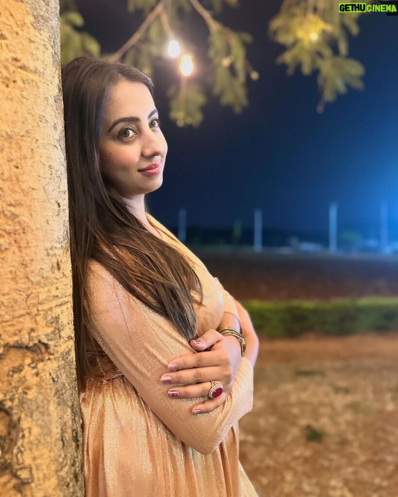 Sanjjanaa Instagram - This maternity friendly gold beautiful dress from India's number one maternity brand, @momzjoy , is truly stunning and looks absolutely stunning on me ! This dress has been specifically designed to cater to the needs of pregnant women & also goes very well on voluptuous woman like me, ensuring both comfort and style . the dress is designed with a maternity-friendly silhouette. It takes into consideration the changes that occur in a woman's body during pregnancy, such as a growing belly and fluctuating bust size. The dress provides ample room for your bump to grow comfortably, allowing you to move freely without any constraints and also most importantly, it is feeding friendly once your infant arrives. Additionally, the fabric used in this dress is carefully selected to ensure utmost comfort. It is soft, breathable, and stretchy, providing a gentle embrace to our changing body . The design of the dress is both fashionable and functional. It may feature a wrap-style front, or an empire waistline, all of which accentuate to woman’s beautiful curves and create a flattering silhouette. The dress may also include discreet nursing access, allowing you to breastfeed your baby conveniently while maintaining your style. As India's number one maternity brand, Momzjoy prioritizes the needs and desires of pregnant women, ensuring that their clothing not only meets the highest quality standards but also reflects the latest fashion trends. Their attention to detail and commitment to creating maternity-friendly designs is evident in this gold beautiful dress. Overall, this maternity dress from Momzjoy is a perfect choice, combining the elegance of gold with the comfort and functionality required during pregnancy. You can confidently wear this dress for various occasions, whether it's a special event, a party, or a casual outing, knowing that you look absolutely stunning and feel comfortable at the same time. - @sanjjanaagalrani Karnataka, Bangalore