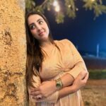 Sanjjanaa Instagram - This maternity friendly gold beautiful dress from India's number one maternity brand, @momzjoy , is truly stunning and looks absolutely stunning on me ! This dress has been specifically designed to cater to the needs of pregnant women & also goes very well on voluptuous woman like me, ensuring both comfort and style . the dress is designed with a maternity-friendly silhouette. It takes into consideration the changes that occur in a woman's body during pregnancy, such as a growing belly and fluctuating bust size. The dress provides ample room for your bump to grow comfortably, allowing you to move freely without any constraints and also most importantly, it is feeding friendly once your infant arrives. Additionally, the fabric used in this dress is carefully selected to ensure utmost comfort. It is soft, breathable, and stretchy, providing a gentle embrace to our changing body . The design of the dress is both fashionable and functional. It may feature a wrap-style front, or an empire waistline, all of which accentuate to woman’s beautiful curves and create a flattering silhouette. The dress may also include discreet nursing access, allowing you to breastfeed your baby conveniently while maintaining your style. As India's number one maternity brand, Momzjoy prioritizes the needs and desires of pregnant women, ensuring that their clothing not only meets the highest quality standards but also reflects the latest fashion trends. Their attention to detail and commitment to creating maternity-friendly designs is evident in this gold beautiful dress. Overall, this maternity dress from Momzjoy is a perfect choice, combining the elegance of gold with the comfort and functionality required during pregnancy. You can confidently wear this dress for various occasions, whether it's a special event, a party, or a casual outing, knowing that you look absolutely stunning and feel comfortable at the same time. - @sanjjanaagalrani Karnataka, Bangalore