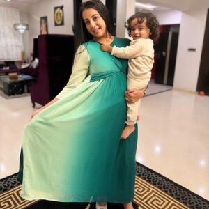Sanjjanaa Instagram - Parenthood is indeed a journey filled with challenges and sacrifices, but it also brings countless joys and beautiful moments. It’s wonderful to see how effortlessly comfortable my outfit from @momzjoy looks while i am holding my baby in my arms. This showcases the versatility and practicality of clothing designed for @momzjoy , allowing me to attend various events while still being able to care for your little one with ease. Parenthood teaches us to embrace every moment and find beauty in the chaos. Enjoying these precious times with my baby and yet look super stylish like a Mom #diva wearing stylish attires from  @momzjoy ! 

As an actress, my life has been consumed by self-centeredness, solely dedicated to my career, personal aspirations, and ambitions in the past. But, oh, how everything shifted when my beloved son, @PrinceAlarik, graced my existence with his presence.

As I stepped into the realm of motherhood, a beautiful transformation occurred within me. It was as if a veil had been lifted, revealing a profound shift in my perspective. Suddenly, the needs and happiness of my precious child became the centerpiece of my world, eclipsing my own dreams and aspirations. This profound metamorphosis had far-reaching effects, intertwining with every facet of my existence. From the choices I made in my professional journey to the way I managed my time, everything now revolved around nurturing and cherishing my little one. With tender devotion, I embraced the path of motherhood, prioritizing the bonds of my cherished family above all else.

The overwhelming bliss and deep affection that fills my heart for my beloved son are beyond measure. Every single moment spent with him holds profound significance, as I treasure the precious milestones and witness his remarkable growth and development ...
