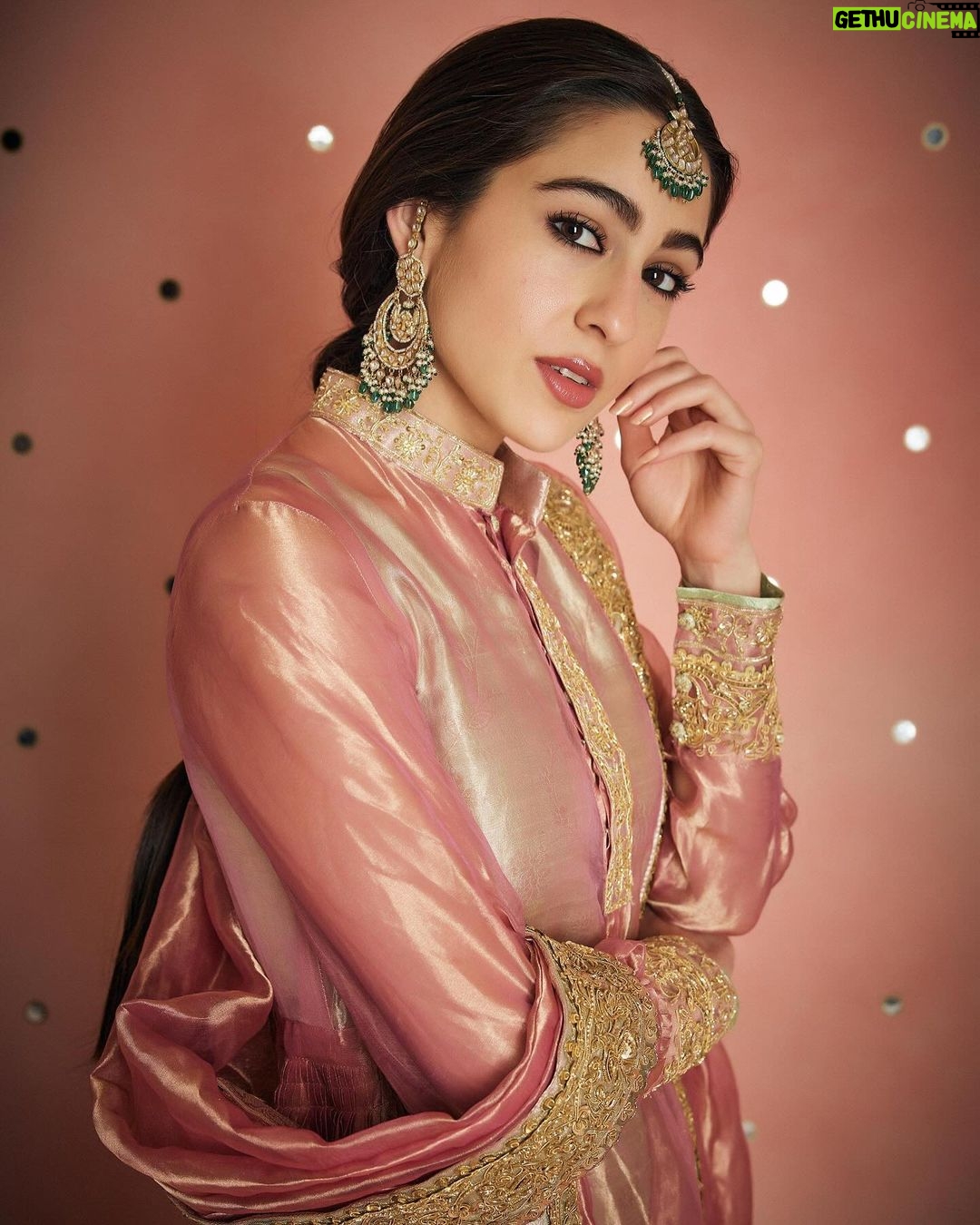 Sara Ali Khan Instagram - Thank you Badi Amma for the loveliest traditional Zardosi gold border πΈ Everyone knows sheβs the epitome of grace and royalty- everyone always adored her π₯° Thank you @manishmalhotraworld @manishmalhotra05 for recreating this style, adding your sparkle and giving it order πβ¨ And thank you @______iak______ for just being the most regally handsome brother in @raghavendra.rathore and posing with your sister who behaves like a recorder π€£πΉπΈ And of course @rohanshrestha @adrianjacobsofficial @aasifahmedofficial a heartfelt special thanks is totally in order ππ»π€π«