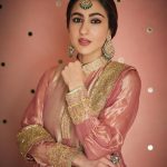 Sara Ali Khan Instagram – Thank you Badi Amma for the loveliest traditional Zardosi gold border 👸
Everyone knows she’s the epitome of grace and royalty- everyone always adored her 🥰
Thank you @manishmalhotraworld @manishmalhotra05 for recreating this style, adding your sparkle and giving it order 💝✨
And thank you @______iak______ for just being the most regally handsome brother in @raghavendra.rathore and posing with your sister who behaves like a recorder 🤣📹📸
And of course @rohanshrestha @adrianjacobsofficial @aasifahmedofficial a heartfelt special thanks is totally in order 🙏🏻🤗🫂