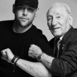 Scooter Braun Instagram - Today I had the honor of meeting 101 year old holocaust survivor Joseph Alexander for a project that’s deeply meaningful. Something impactful is taking shape. Joseph’s story is amazing being one of the few Polish Jews to survive the Holocaust. He lived somehow through 12 camps from 1939 to 1945 even at times in the same camps as both my grandparents. People need to understand that in 1938 there were over 3 million Jews in Poland and in 1945 only 300,000 were left. Joseph lost everyone. I was honored to spend time with him and when he showed me his tattoo from Auschwitz I showed him mine in honor of my grandmother. See the camp gave you 6 numbers. From there you had no name you were just a #. My tattoo is 6 numbers representing the birth of my children. Each child is another 6 numbers of their birthdate. The nazis gave us numbers to take away life and humanity. Mine represent giving it back. Look forward to seeing Joe again soon and can’t wait to share this project and his stories with you all soon. Last thing . I asked Joe what he thought of today. He said it’s awful but we have to all forgive and remove hate. He said he hates no one. He holds no grudge. He wants all people, no matter what they look like or what religion they are, to have peace and a chance at a beautiful life. See after the war Joe was liberated and sent to Germany. He lived amongst those that once tried to kill him. Joe forgave them. He said he never forgot those he lost but I he lived on for them. No hate and no grudge in his heart. He said to hold on to it would have been “poison.” He said people ask him why he never removed the tattoo. He said he wanted the reminder so he could speak and teach what he learned and what he lost. I wish we all had Joe’s wisdom. More to come. Thank you Joe. Truly honored
