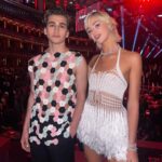 Sebastian Croft Instagram - inspiring evening at the British Fashion Awards, thank you @vestiaireco for having me. wearing an archive @jonathan.anderson top from his first solo menswear show, burberry trousers and @stefan_cooke shoes. All found via @vestiaireco Jewlery @cartier ✨ Tilda Swinton speaks in some kind of magical poetry. I’m completely in awe of her Styled by @harry_lambert Grooming @svenbayerbach Nails by @simmy_nailsandbeauty Royal Albert Hall