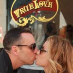 Sebastian Maniscalco Instagram - Behold the romantic escapades of the early 2000s: where grand country clubs and sun-kissed Italian coasts set the scene for our amorous adventures. For there is none other with whom I would rather traverse the globe, hand in hand, than you, my beloved. Watch our story unfold in my upcoming movie About My Father - in theaters May 26. What’s your favorite romantic memory? #AboutMyFather @aboutmyfather #thatsamore