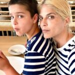 Selma Blair Instagram – My Saint, Arthur, happy birthday 🎂. 
This has been the most incredible life with you. Forever my favorite, I know you are going to have the best year yet. I am so proud of who you are and have become. Usually 🦁. The most adorable little kid has grown into a 12 year old!!!! 🐣🦅. I love you and I like you.  Massively. 💛 mom 

Image descriptions: 1. A younger Arthur sits inside a brown handbag next to Selma while both look at the camera. They are poolside. 2. A 12-year old Arthur with short hair sitting on his motorbike and looking at camera. 3. Selma and Arthur wearing blue and white striped shirts sitting next to each other and looking at camera. 4. Arthur and Jason are on a boat with the sun and ocean behind them. They are smiling and looking at camera. 5. Selma, Arthur, and her dog Scout laying in bed. 6. Arthur in a striped sweater cuddles their dog Pippa. 7. An older photo of Selma and Arthur. Selma has long hair and they are smiling at the camera. 8. Selma and Arthur sit in bed. Selma is looking at Arthur and Arthur is looking into the distance. 9. Arthur in a blue shirt and short hair cuddles their dog Scout. 10. A younger Arthur with wild hair holding a guitar and smiling at camera.