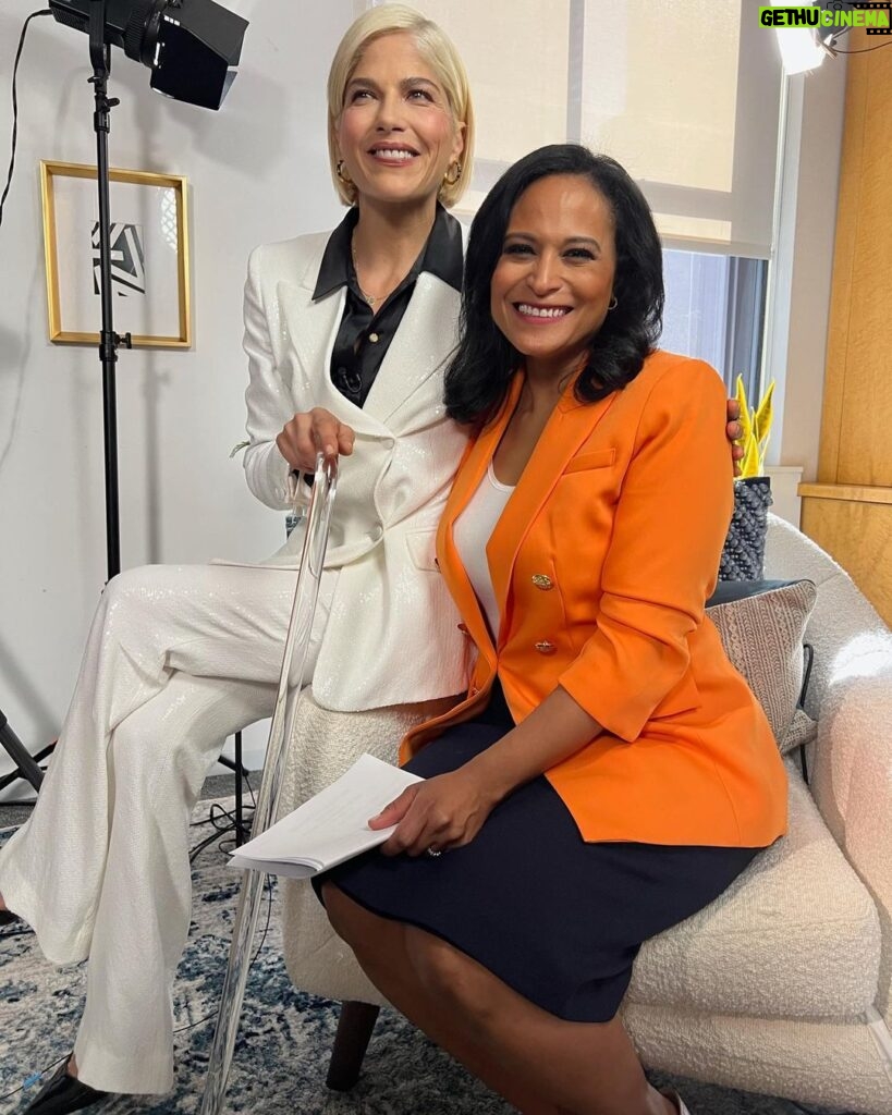 Selma Blair Instagram - I am honored and privileged to have been interviewed by @kristen.welker for @meetthepress on NBC. Watch the full interview — link in Stories. Descriptions: 1) Selma wears a white suit and uses a clear lucite cane, sitting next to Kristen Welker, wearing an orange jacket and black skirt. They are sitting next to each other and smiling at the camera. 2) Selma speaks to Kristen in an interview. 3 and 4) behind the scenes of Selma and Kristen sitting in a living room for the interview, with equipment around them. 5) Selma with no makeup and wearing glasses, holds a “Meet The Press” mug.