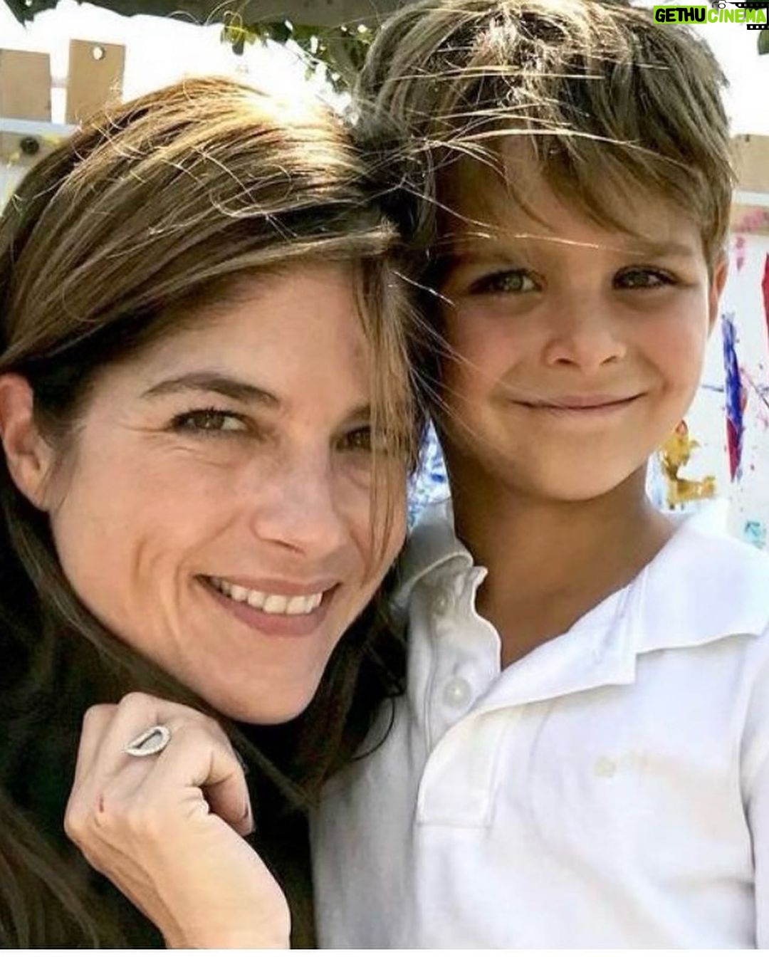 Selma Blair Instagram - My Saint, Arthur, happy birthday π. This has been the most incredible life with you. Forever my favorite, I know you are going to have the best year yet. I am so proud of who you are and have become. Usually π¦. The most adorable little kid has grown into a 12 year old!!!! π£π¦
. I love you and I like you. Massively. π mom Image descriptions: 1. A younger Arthur sits inside a brown handbag next to Selma while both look at the camera. They are poolside. 2. A 12-year old Arthur with short hair sitting on his motorbike and looking at camera. 3. Selma and Arthur wearing blue and white striped shirts sitting next to each other and looking at camera. 4. Arthur and Jason are on a boat with the sun and ocean behind them. They are smiling and looking at camera. 5. Selma, Arthur, and her dog Scout laying in bed. 6. Arthur in a striped sweater cuddles their dog Pippa. 7. An older photo of Selma and Arthur. Selma has long hair and they are smiling at the camera. 8. Selma and Arthur sit in bed. Selma is looking at Arthur and Arthur is looking into the distance. 9. Arthur in a blue shirt and short hair cuddles their dog Scout. 10. A younger Arthur with wild hair holding a guitar and smiling at camera.