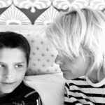 Selma Blair Instagram - My Saint, Arthur, happy birthday 🎂. This has been the most incredible life with you. Forever my favorite, I know you are going to have the best year yet. I am so proud of who you are and have become. Usually 🦁. The most adorable little kid has grown into a 12 year old!!!! 🐣🦅. I love you and I like you. Massively. 💛 mom Image descriptions: 1. A younger Arthur sits inside a brown handbag next to Selma while both look at the camera. They are poolside. 2. A 12-year old Arthur with short hair sitting on his motorbike and looking at camera. 3. Selma and Arthur wearing blue and white striped shirts sitting next to each other and looking at camera. 4. Arthur and Jason are on a boat with the sun and ocean behind them. They are smiling and looking at camera. 5. Selma, Arthur, and her dog Scout laying in bed. 6. Arthur in a striped sweater cuddles their dog Pippa. 7. An older photo of Selma and Arthur. Selma has long hair and they are smiling at the camera. 8. Selma and Arthur sit in bed. Selma is looking at Arthur and Arthur is looking into the distance. 9. Arthur in a blue shirt and short hair cuddles their dog Scout. 10. A younger Arthur with wild hair holding a guitar and smiling at camera.