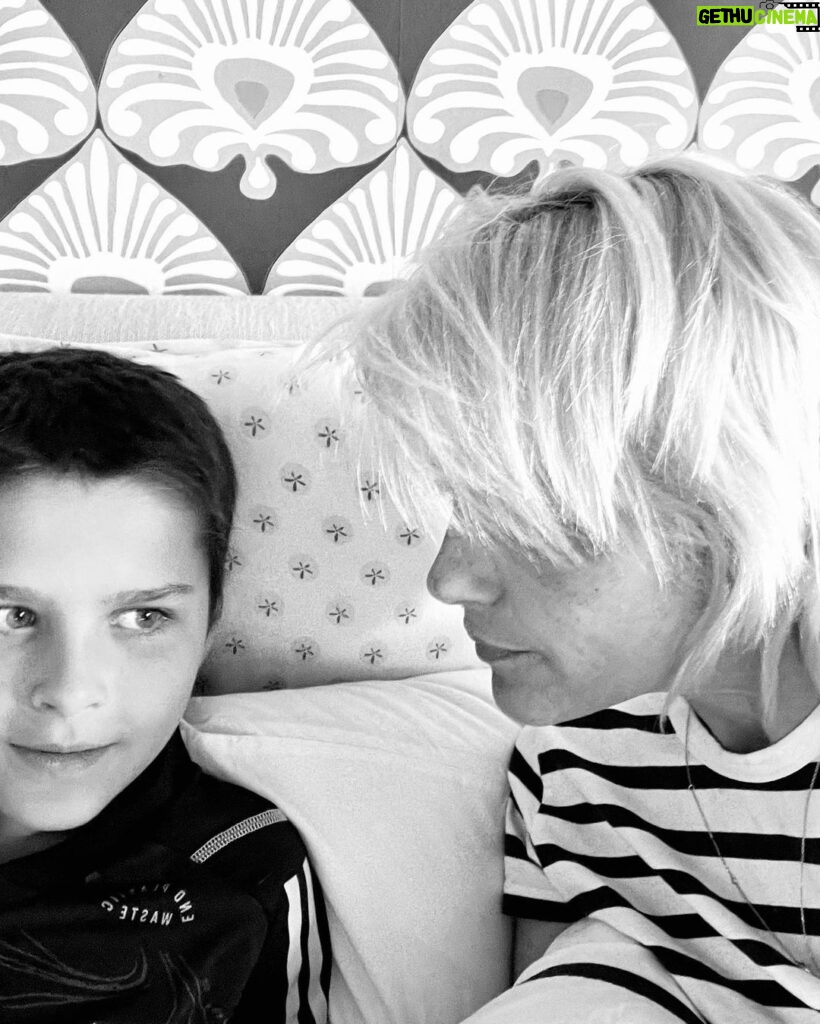 Selma Blair Instagram - My Saint, Arthur, happy birthday 🎂. This has been the most incredible life with you. Forever my favorite, I know you are going to have the best year yet. I am so proud of who you are and have become. Usually 🦁. The most adorable little kid has grown into a 12 year old!!!! 🐣🦅. I love you and I like you. Massively. 💛 mom Image descriptions: 1. A younger Arthur sits inside a brown handbag next to Selma while both look at the camera. They are poolside. 2. A 12-year old Arthur with short hair sitting on his motorbike and looking at camera. 3. Selma and Arthur wearing blue and white striped shirts sitting next to each other and looking at camera. 4. Arthur and Jason are on a boat with the sun and ocean behind them. They are smiling and looking at camera. 5. Selma, Arthur, and her dog Scout laying in bed. 6. Arthur in a striped sweater cuddles their dog Pippa. 7. An older photo of Selma and Arthur. Selma has long hair and they are smiling at the camera. 8. Selma and Arthur sit in bed. Selma is looking at Arthur and Arthur is looking into the distance. 9. Arthur in a blue shirt and short hair cuddles their dog Scout. 10. A younger Arthur with wild hair holding a guitar and smiling at camera.