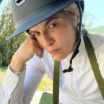 Selma Blair Instagram - This is my social life and it’s pretty grand. Mr Nibbles gives me all the emotions. 🎭 It’s getting hot out here, drink your water 💁🏼💦 Image Descriptions: Image 1: Selma has short blonde hair and wears a white long sleeve shirt. She is smiling and standing next to her white horse. Image 2: Selma wears a white long sleeve, tan pants, boots, and a helmet and is sitting outside. Video: Video of Selma riding her horse Image 3: Selma poses with her horse Image 4: Close up image of Selma in her riding gear. Image 5: Selma poses with her horse.