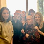Selma Blair Instagram - New York Times best seller 📚 @jennyjacksonpineapple! Not only do you have the rare ability to edit the greats, myself included, but you can create the perfect generational east coast Rich Family story that we all love. So witty and lively and gorgeously written. Congratulations I love you!!! 💛🍍 Image Descriptions: Image 1: Selma has short blonde hair and is wearing a green sweater. She is laying in bed in her back holding the book Pineapple Street on her chest. Image two: Selma is bald and is standing on the left wearing a black jacket looking at Jenny Jackson, who has long blonde hair and is also wearing black. Image three: Selma stands in the middle of a group of five people. Image four: The New York Times Best Seller list. Pineapple Street is listed at number 5 and highlighted in purple.