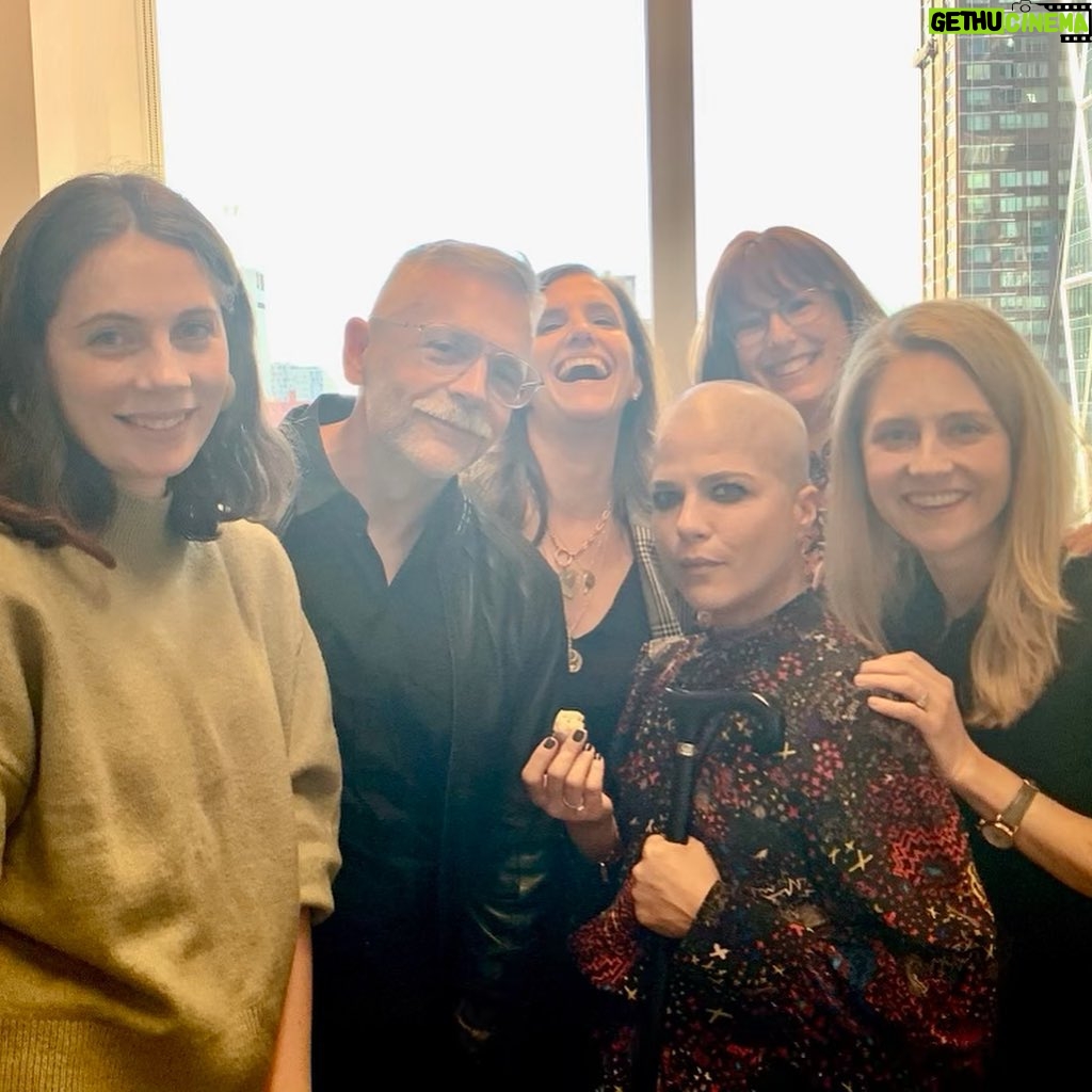 Selma Blair Instagram - New York Times best seller π @jennyjacksonpineapple! Not only do you have the rare ability to edit the greats, myself included, but you can create the perfect generational east coast Rich Family story that we all love. So witty and lively and gorgeously written. Congratulations I love you!!! ππ Image Descriptions: Image 1: Selma has short blonde hair and is wearing a green sweater. She is laying in bed in her back holding the book Pineapple Street on her chest. Image two: Selma is bald and is standing on the left wearing a black jacket looking at Jenny Jackson, who has long blonde hair and is also wearing black. Image three: Selma stands in the middle of a group of five people. Image four: The New York Times Best Seller list. Pineapple Street is listed at number 5 and highlighted in purple.