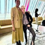 Selma Blair Instagram - London 🖤. It was time. We love you. I only wish I could stay longer. This time in London has been so good for my northern soul. And my son was enchanted as well. We met our dearest friends. Been too long. and I’m changed. Thank you Image descriptions: Image 1: Selma has short blonde hair and is standing with the London skyline behind her. Image 2: Selma and Arthur sit in separate chairs. Arthur has short brown hair and sitting on the left in a chair in a hotel lobby with black and white floor. Image 3: Silhouette of Selma holding her cane with a long coat on. Image 4: Arthur is on left wearing black jacket with a hoodie, hugging Stella, who is wearing long sleeve grey shirt. Image 5: Selma and Arthur walking to music that Stella, whose back is to the camera, plays on her phone. Image 6: Selma is standing with her cane next to Vanessa Kingori who is on the left wearing a light green outfit with her arm around Selma. Image 7: Selma is wearing a grey suit and holds her cane. She is standing outside, surrounded by lit up trees. Image 8: Selma is on the left kneeling with her cane in front of her next to Katie who has brown hair and is wearing glasses and wearing white boots. Image 9: Black and white photo of Selma with Anya Taylor Joy, who has long, straight blonde hair. Image 10: Video of Selma and Arthur walking on the street in London. London, England