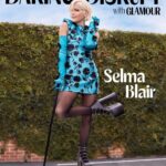 Selma Blair Instagram - When Selma Blair was diagnosed with multiple sclerosis at age 46, it was a relief—it explained the physical pain and neurological symptoms she had experienced since childhood. It was also the start of a new journey during which the actor became an author, an advocate, and an audience-favorite Dancing With the Stars contestant. Today Blair tells Glamour, with unflinching honesty, about her desire to return to acting and find love. At the 2023 Glamour Women of the Year Awards on November 7, she’ll accept the Daring to Disrupt Award, presented by @ally. #GlamourWOTY Photographed by @laurendukoff Stylist:@erinwalshstyle Hair: @hairbyjohnd Makeup: @mollyrstern Manicurist: @tombachik On Set Producer: @ctdinc Image Description: Selma with short blonde hair wearing a mini teal dress with black floral print and matching full length gloves and black strappy boots. Selma uses a black cane and is standing on a white platform. Black text reads “Daring to Disrupt with Glamour” and white text reads “Selma Blair.”