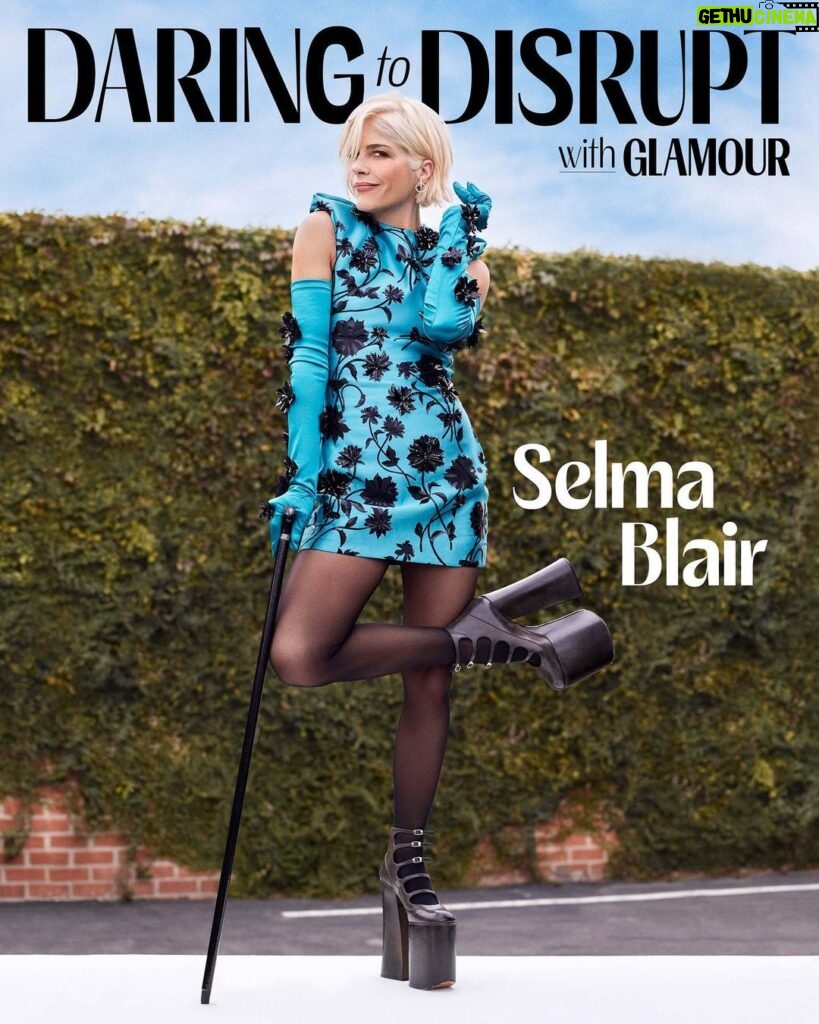 Selma Blair Instagram - When Selma Blair was diagnosed with multiple sclerosis at age 46, it was a relief—it explained the physical pain and neurological symptoms she had experienced since childhood. It was also the start of a new journey during which the actor became an author, an advocate, and an audience-favorite Dancing With the Stars contestant. Today Blair tells Glamour, with unflinching honesty, about her desire to return to acting and find love. At the 2023 Glamour Women of the Year Awards on November 7, she’ll accept the Daring to Disrupt Award, presented by @ally. #GlamourWOTY Photographed by @laurendukoff Stylist:@erinwalshstyle Hair: @hairbyjohnd Makeup: @mollyrstern Manicurist: @tombachik On Set Producer: @ctdinc Image Description: Selma with short blonde hair wearing a mini teal dress with black floral print and matching full length gloves and black strappy boots. Selma uses a black cane and is standing on a white platform. Black text reads “Daring to Disrupt with Glamour” and white text reads “Selma Blair.”