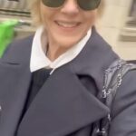 Selma Blair Instagram - London 🖤. It was time. We love you. I only wish I could stay longer. This time in London has been so good for my northern soul. And my son was enchanted as well. We met our dearest friends. Been too long. and I’m changed. Thank you Image descriptions: Image 1: Selma has short blonde hair and is standing with the London skyline behind her. Image 2: Selma and Arthur sit in separate chairs. Arthur has short brown hair and sitting on the left in a chair in a hotel lobby with black and white floor. Image 3: Silhouette of Selma holding her cane with a long coat on. Image 4: Arthur is on left wearing black jacket with a hoodie, hugging Stella, who is wearing long sleeve grey shirt. Image 5: Selma and Arthur walking to music that Stella, whose back is to the camera, plays on her phone. Image 6: Selma is standing with her cane next to Vanessa Kingori who is on the left wearing a light green outfit with her arm around Selma. Image 7: Selma is wearing a grey suit and holds her cane. She is standing outside, surrounded by lit up trees. Image 8: Selma is on the left kneeling with her cane in front of her next to Katie who has brown hair and is wearing glasses and wearing white boots. Image 9: Black and white photo of Selma with Anya Taylor Joy, who has long, straight blonde hair. Image 10: Video of Selma and Arthur walking on the street in London. London, England