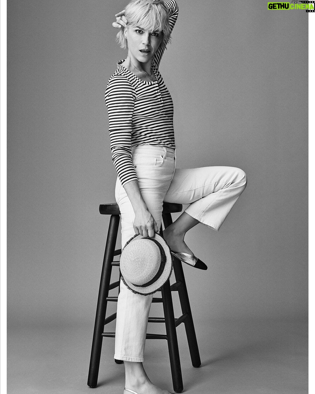 Selma Blair Instagram - Felicitations! @lalignenyc π I could not be prouder to be here in your denim La launch π. Sometimes you get a perfect day. A perfect group. A perfect fit π. La Ligne is something I truly live in and love. And now to have denimβ¦π Brava ladies! I love you. Image Descriptions: Image one: Selma has short blonde hair and wears black jeans, black heels, and a brown long sleeve top. Image two: Black and white image of Selma posing with her cane. She wears jeans, heels, and a button down top Image three: Selma wears a button down, black jeans and loafers. She is leaning on a couch that is laying on its side. Image four: Black and white image of Selma laying on a couch. Image five: Selma wears a blue and red striped sweater and loose blue jeans. She is standing with one hand on her face. Image six: Black and white image of Selma. She is wearing a striped shirt and is standing next to a stool with one foot on it. Selma holds a hat in her hand. Image seven: Selma wears a La Ligne graphic T-shirt and jeans. She is shown buttoning up the jeans.