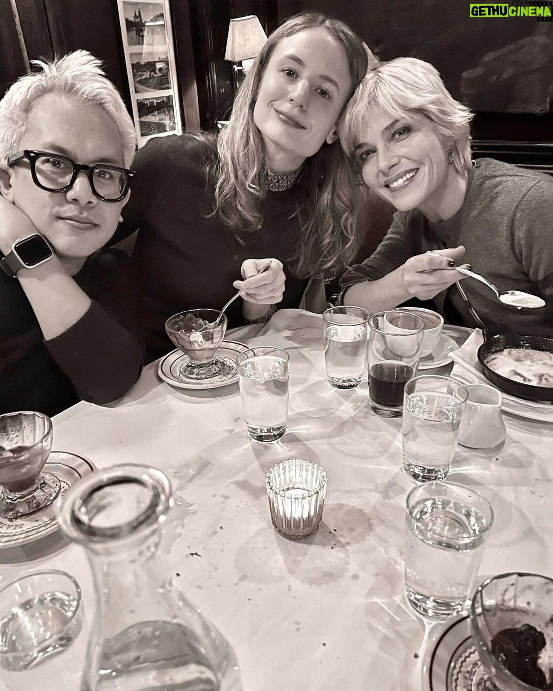 Selma Blair Instagram - 🤍🗽 Image Descriptions: 1. Selma has short blonde hair and is sitting on brick balcony wearing a grey coat with black collar. 2. Black/white photo of Selma and Christian Siriano at dinner. Christian has short dark hair and is wearing a black tshirt. 3. Selma is wearing a black sweater and sunglasses. A man is seated behind her playing with her dog Scout. 4. Black/white photo of Selma, Art Tavee and Carolyn Griffin at dinner. Art has short light hair and wears glasses and Carolyn has shoulder length hair. 5. Selma, Troy, Art, and Carolyn posing together for a selfie outside at dinner. 6. Selma posing in the mirror in a hotel bathroom. There are pink flowers in the focus of the photo. She wears a black sweater with a white collared shirt under it. New York, New York