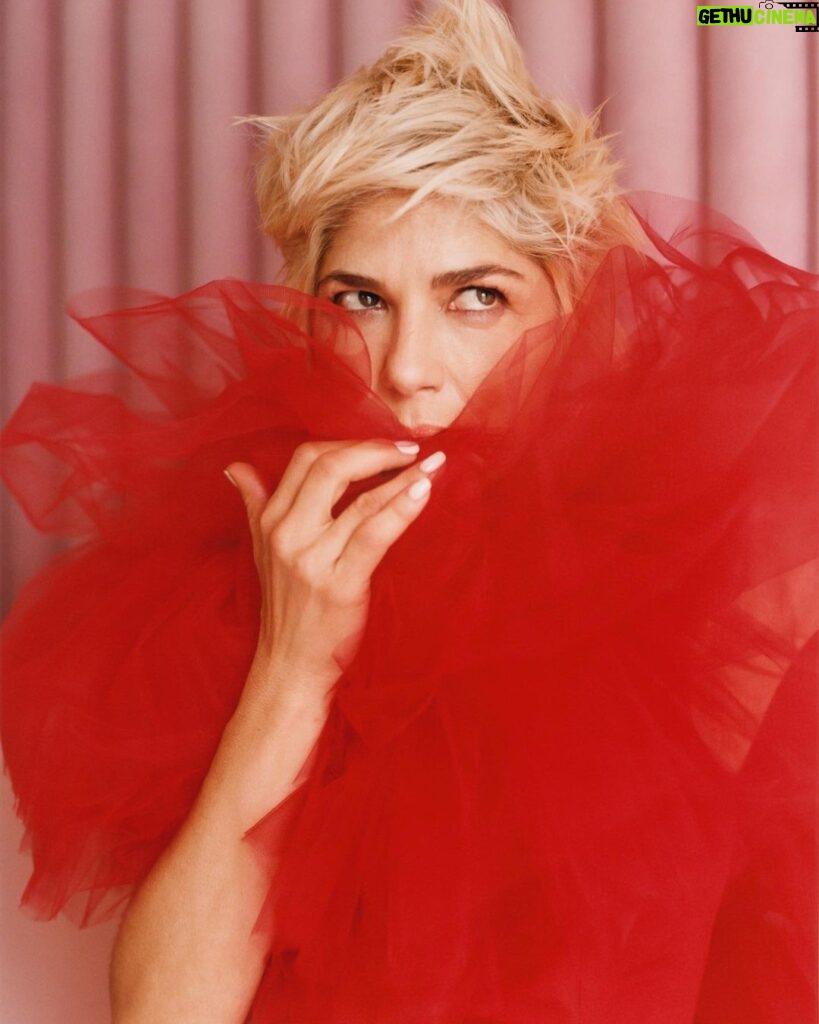 Selma Blair Instagram - “I was overwhelmed by a sense of relief,” recalling the moment I found out about my MS, “like the way you feel when an ocean wave breaks right at the shore before taking you under.” @SELFmagazine cover story is out now. 🤍 Thank you to this brilliant team — SELF: @selfmagazine Photography: @heatherhazzan  Wardrobe styling: @seanknight Hair: @bridgetbragerhair Makeup: @karayoshimotobua Manicure: @ashlie_johnson  Profile: @emmacargo   Creative Director: @avenerable  Entertainment Directors: @cbroday & @sergiokletnoy Image Descriptions: 1. Selma has short blonde hair and is seated holding her hands in front of her wearing a green dress and gloves. The text SELF and Spotlight in Selma appear on image. 2. Selma is standing in profile wearing a white dress and gloves. 3. Selma’s face appears in the middle of the red fabric of her dress. 4. Polaroid of Selma wearing black tank top with feathers while punching towards the camera. 5. Series of 8 images of Selma seated in red dress on pink couch. 6. Selma is wearing the black top and jeans while winking. 7. Black and white image of Selma in white dress and gloves with her signature and a heart on image. She is slightly bent and smiling.