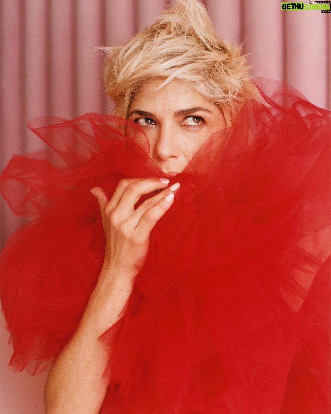 Selma Blair Instagram - “I was overwhelmed by a sense of relief,” recalling the moment I found out about my MS, “like the way you feel when an ocean wave breaks right at the shore before taking you under.” @SELFmagazine cover story is out now. 🤍 Thank you to this brilliant team — SELF: @selfmagazine Photography: @heatherhazzan Wardrobe styling: @seanknight Hair: @bridgetbragerhair Makeup: @karayoshimotobua Manicure: @ashlie_johnson Profile: @emmacargo Creative Director: @avenerable Entertainment Directors: @cbroday & @sergiokletnoy Image Descriptions: 1. Selma has short blonde hair and is seated holding her hands in front of her wearing a green dress and gloves. The text SELF and Spotlight in Selma appear on image. 2. Selma is standing in profile wearing a white dress and gloves. 3. Selma’s face appears in the middle of the red fabric of her dress. 4. Polaroid of Selma wearing black tank top with feathers while punching towards the camera. 5. Series of 8 images of Selma seated in red dress on pink couch. 6. Selma is wearing the black top and jeans while winking. 7. Black and white image of Selma in white dress and gloves with her signature and a heart on image. She is slightly bent and smiling.