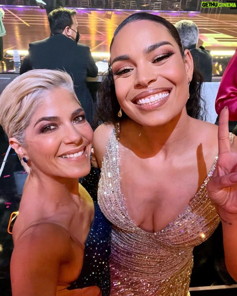 Selma Blair Instagram - Congratulations @charlidamelio. A genius of a dancer, elegant and kind, you deserve all the success in everything you engage in. I love you. What a time it has been. Lasting friends have been found, and I believe the adventures have only just begun. @itsshangela, you have enchanted us all. @gabby.windey, beyond adored, hysterical, and wonderful, you, with the legs to the North Pole. And @mrbradybaby, the one with limitless brilliance, each of you had proven to be the top shelf stuff! And the rest of us losers, I love you beyond. @sashafarber1 … I know where you live. Image Descriptions: Image 1: Charli D’Amelio, Selma and Arthur are standing onstage at DWTS. Charli is on the left in a yellow dress with her dark hair pulled back holding the mirror ball trophy. Selma is standing in the middle in a blue dress with side cutouts, has short blonde hair and is holding her phone up taking a selfie with Charli and Arthur. Arthur has brown hair and is standing on the right wearing all white looking up at camera. Image 2: Arthur is standing on left while Teresa Giuduce, who is wearing a short gold dress, leans down and kisses him on cheek. Image 3: Daniel Durant has brown hair and is standing on the left in a blue shirt next to Selma. They are on the ballroom floor. Image 4: Selma is sitting on the left while Wayne Brady stands on the right wearing a gold jacket. Image 5: Arthur is standing on the stairs outside wearing a mask while Gabby Windey is kneeling down next to him. She is wearing red and black. Image 6: Arthur is standing on stage hugging Shangela. Image 7: Cheryl Burke is on the left. She has light brown hair and is wearing a one shoulder sparkly dress. Selma is next to her on the right. Image 8: Selma is on the left holding a drink while looking up at Sasha. He is seated and has dark hair and a dark shirt. Image 9: Selma is on the left looking at the camera smiling. She is next to Jordin Sparks who has long dark hair pulled back and is wearing a gold dress. Image 10: Video of Selma and Arthur going outside while members of the DWTS crew applaud her.