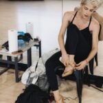 Selma Blair Instagram - Oh the places I’ve been! But I never considered I would be in a dance rehearsal space for a live @disneyplus ballroom dance show. And I loved every single second of it. Having an “atta girl” from so many people in my life and on here and in the @dancingwiththestars 🪩 world has changed me for the better. And always to @sashafarber1 for being my first and only partner. All love. 💜 thank you @arttavee for always holding me in frame as well. I love you 📷 Series of images of Selma and Sasha in both color and black and white in a dance studio. Selma has short blonde hair and is wearing a black bodysuit. Sasha has short dark hair and is wearing a striped shirt in some images and no shirt in others. Selma’s dog Scout is in the third image on the right in the photo.