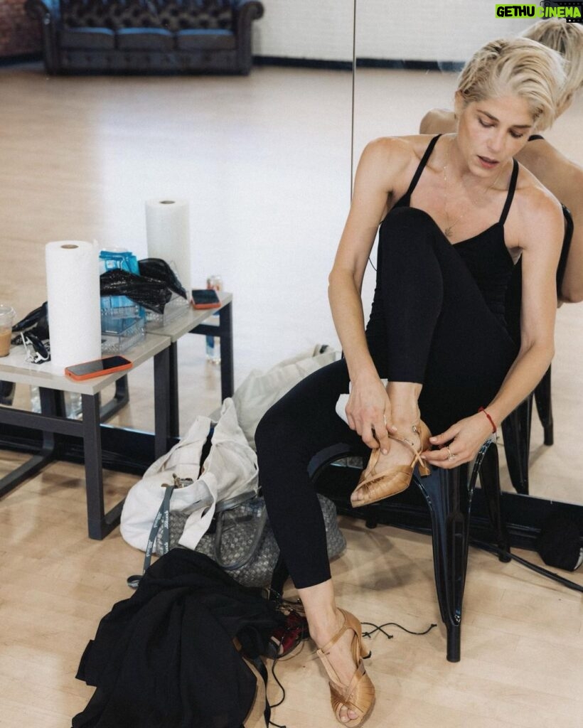 Selma Blair Instagram - Oh the places I’ve been! But I never considered I would be in a dance rehearsal space for a live @disneyplus ballroom dance show. And I loved every single second of it. Having an “atta girl” from so many people in my life and on here and in the @dancingwiththestars 🪩 world has changed me for the better. And always to @sashafarber1 for being my first and only partner. All love. 💜 thank you @arttavee for always holding me in frame as well. I love you 📷 Series of images of Selma and Sasha in both color and black and white in a dance studio. Selma has short blonde hair and is wearing a black bodysuit. Sasha has short dark hair and is wearing a striped shirt in some images and no shirt in others. Selma’s dog Scout is in the third image on the right in the photo.