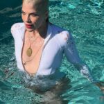 Selma Blair Instagram - Mad about you 💋 [Video Description: Selma has bleached blonde hair and is wearing a white bathing suit while in and around a pool with her dog Scout.]