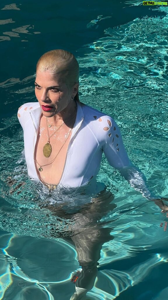 Selma Blair Instagram - Mad about you 💋 [Video Description: Selma has bleached blonde hair and is wearing a white bathing suit while in and around a pool with her dog Scout.]