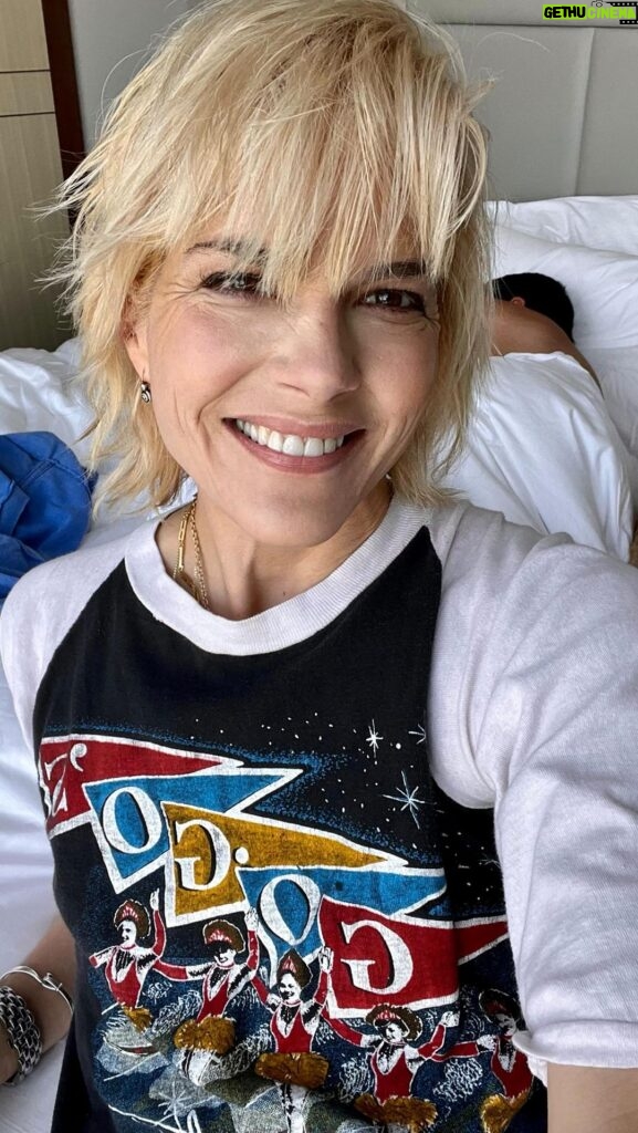 Selma Blair Instagram - Vintage tees in Nashville to celebrate 51. The soundtrack bands of my life. Thank you Troy and Arthur. I’m a very lucky and loved mama. Thank you all for being with me. [Video description: Selma with short blonde hair drinks a cup of coffee in her hotel room in Nashville. Video transitions to a series of selfies in which she’s wearing vintage t-shirts featuring her favorite bands.]