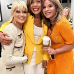 Selma Blair Instagram - You are my slay of the day every day @hodakotb and @jennabhager ! Thank you for having me on @hodaandjenna to talk Mean Baby! 📖💗 Image Descriptions: Image 1: Selma has short blonde hair and is standing on the left in a cream jacket and skirt. Hoda is in the middle in a yellow jacket with her arm around Selma. Jenna is on the right holding a cup of coffee wearing an orange skirt and top. Image 2: Selma getting her makeup touched up by Frankie. Selma is wearing a white robe with clips in her hair. Rita is in the background of the two. Image 3: Selma stands with Kate Young. Selma is wearing a striped shirt and jeans. Kate wears a grey sweater and black pants. Image 4: Selma stands in a matching cream skirt set, sunglasses, and black heels. Kate young is adjusting her outfit. Video: Selma walking into set with her dog, Scout. Selma greets Hoda and Jenna with hugs. Image 5: Selma sits in her robe and smiles to the camera.