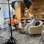 Selma Blair Instagram - I am honored and privileged to have been interviewed by @kristen.welker for @meetthepress on NBC. Watch the full interview — link in Stories. Descriptions: 1) Selma wears a white suit and uses a clear lucite cane, sitting next to Kristen Welker, wearing an orange jacket and black skirt. They are sitting next to each other and smiling at the camera. 2) Selma speaks to Kristen in an interview. 3 and 4) behind the scenes of Selma and Kristen sitting in a living room for the interview, with equipment around them. 5) Selma with no makeup and wearing glasses, holds a “Meet The Press” mug.