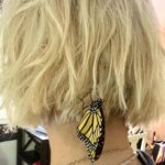 Selma Blair Instagram - I have assigned meaning before their due, searching past reason. But I believe in Transformation. And the reality of the butterfly. And that it has kept me company all afternoon. And still even now. Things are changing 👸 [Image and Video Descriptions: 1. Selma has short blonde hair and has a butterfly covering one eye. 2. The butterfly rests on the back of Selma’s head. 3. Video of Selma outside wearing a blue shirt with white stripes while speaking to the camera with a butterfly on her head.]