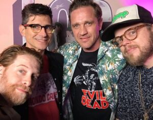 Seth Green Instagram - Idle Hands 20 year reunion! I’ve always loved this unapologetically weird and funny horror movie.

Second pic is a Polaroid from one of the many times we shot through the night. The movie mostly takes place at night, so we saw many a sunrise while shooting, and occasionally took naps in the street while the crew set up the scenes.

Crazy to think how much time has passed since we made this fun and silly movie- thanks to @rooftopcinemaclub for getting the band back together. Thanks to all the fans who showed up and kept this movie in their hearts.