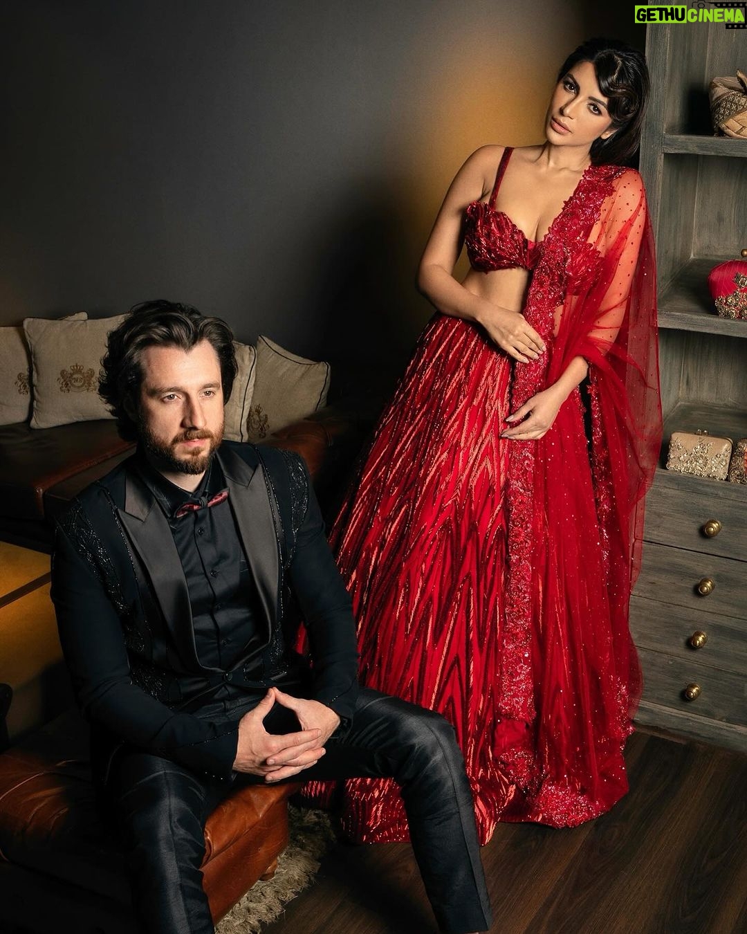 Shama Sikander Instagram - Bold colors, bolder love. ❤️🔥 . Wrapped in- @niveditasaboocouture . . #couplegoals #loveislove #shamasikander